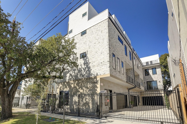 view of property featuring a fenced front yard