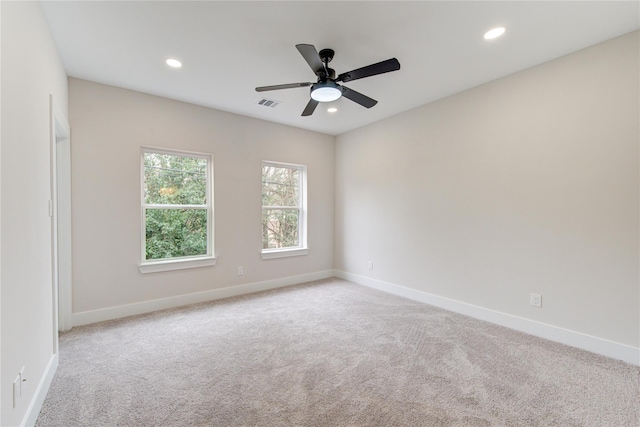 carpeted empty room featuring recessed lighting, baseboards, and ceiling fan