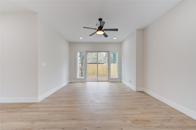 unfurnished room with a ceiling fan, light wood-style flooring, recessed lighting, and baseboards