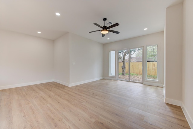 spare room with visible vents, recessed lighting, baseboards, and light wood finished floors