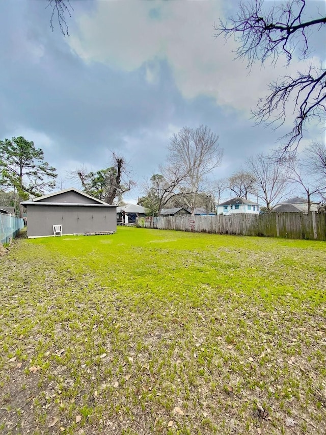 view of yard with fence