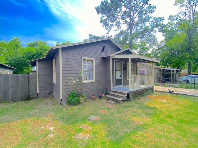 132 Grothe Ln, Houston, TX 77022 - view of front of house with a porch