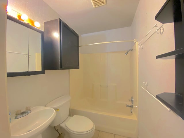 132 Grothe Ln, Houston, TX 77022 - bathroom with a sink, toilet, bathing tub / shower combination, and tile patterned floors