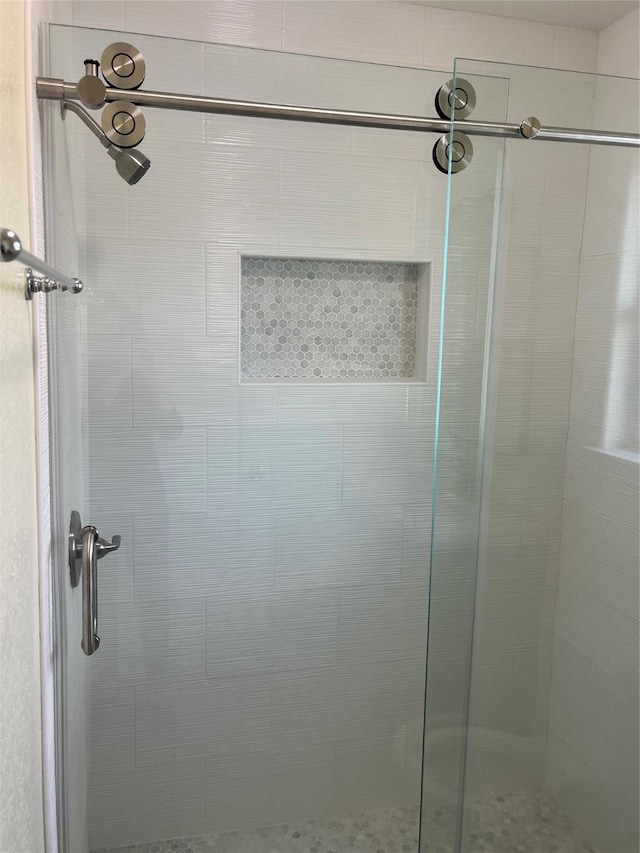 full bath featuring a stall shower