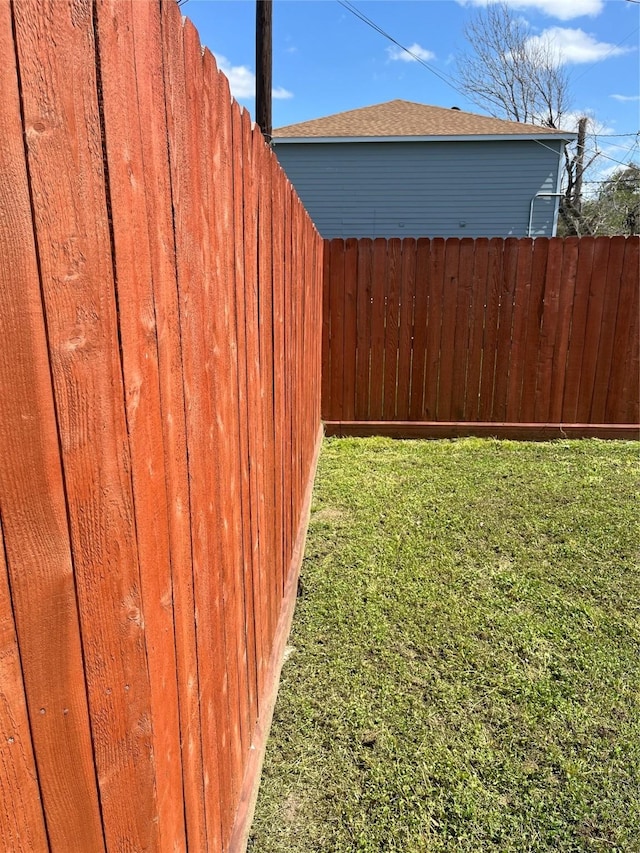 view of yard featuring fence