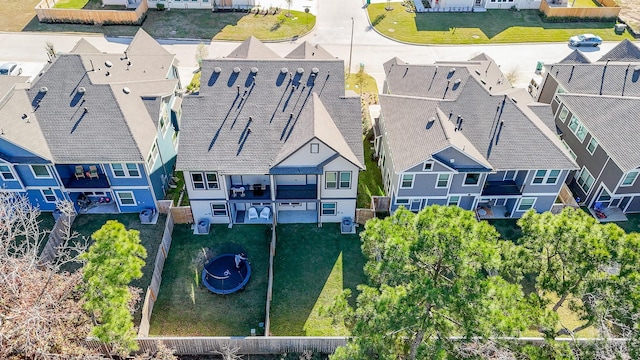 birds eye view of property with a residential view