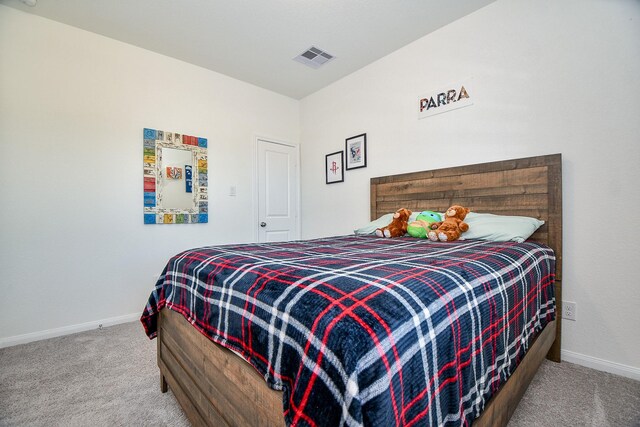 bedroom featuring carpet, visible vents, and baseboards