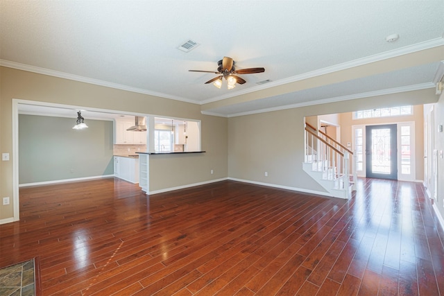 unfurnished living room featuring stairway, baseboards, visible vents, and dark wood-style floors