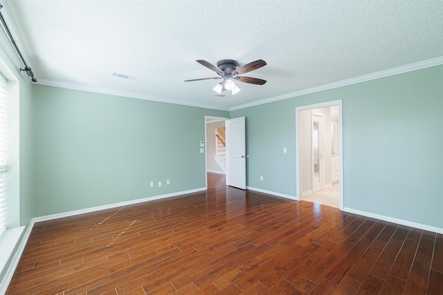 unfurnished bedroom with visible vents, a textured ceiling, wood finished floors, crown molding, and baseboards