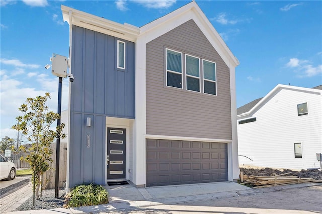 view of front facade featuring a garage and board and batten siding