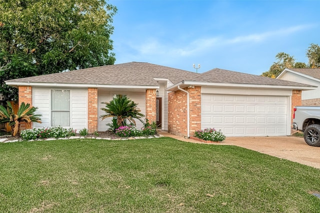 ranch-style house featuring a front lawn, an attached garage, brick siding, and driveway