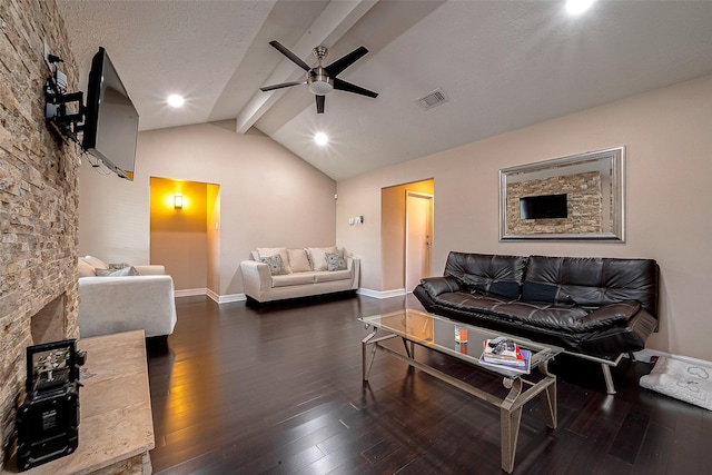 living area featuring visible vents, ceiling fan, baseboards, lofted ceiling with beams, and wood finished floors