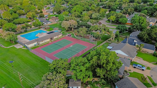 birds eye view of property with a residential view