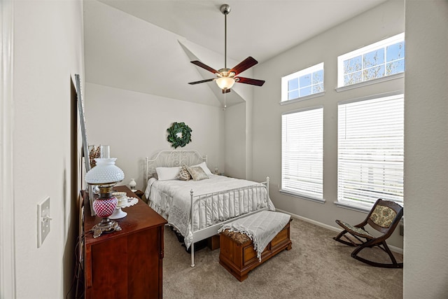 bedroom with baseboards, light carpet, and a ceiling fan