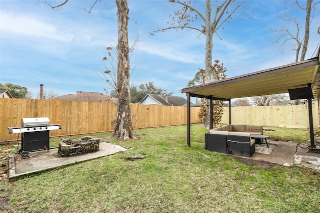 view of yard featuring an outdoor living space with a fire pit, a patio, and a fenced backyard