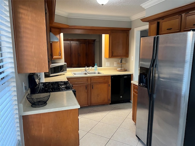 kitchen with light countertops, ornamental molding, appliances with stainless steel finishes, and a sink