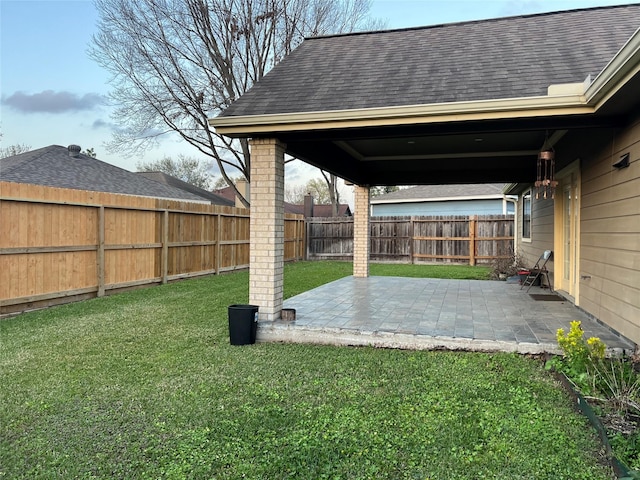 view of yard featuring a fenced backyard and a patio area