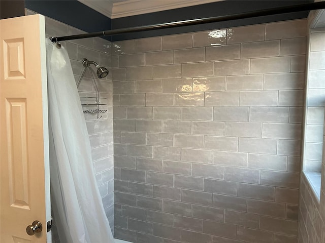 full bath featuring tiled shower