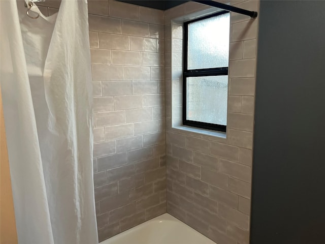 full bath with a wealth of natural light and shower / bath combination with curtain