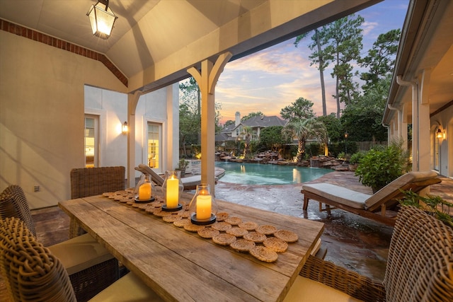 view of patio / terrace featuring a fenced in pool and fence