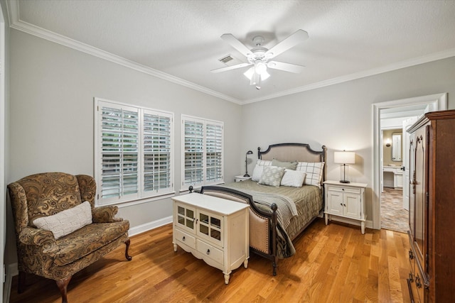 bedroom with crown molding, baseboards, ceiling fan, light wood-style flooring, and a textured ceiling