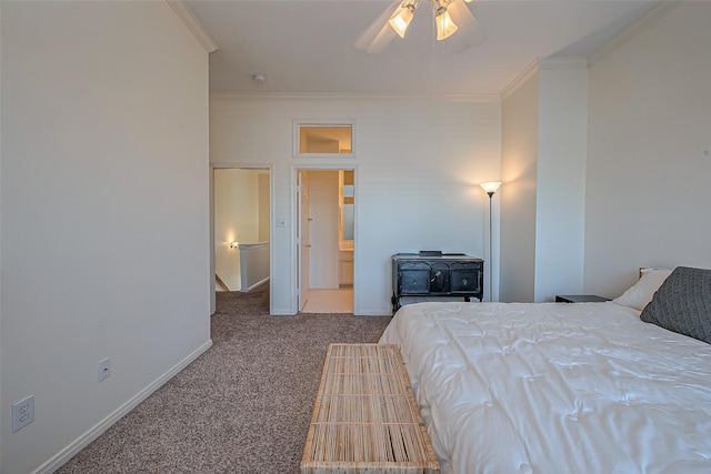 bedroom featuring baseboards, carpet floors, a ceiling fan, and crown molding