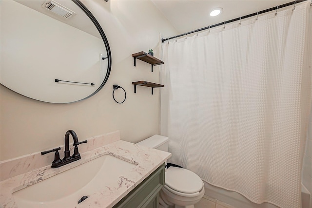 bathroom featuring tile patterned floors, visible vents, toilet, shower / bath combination with curtain, and vanity