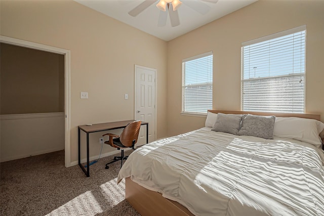 carpeted bedroom featuring a ceiling fan and baseboards