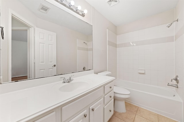 full bath featuring visible vents, toilet, vanity, and washtub / shower combination