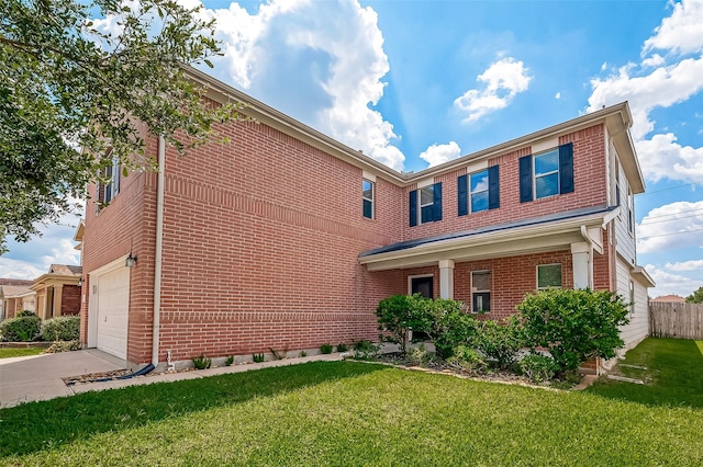 traditional-style house with a front yard, an attached garage, fence, and brick siding