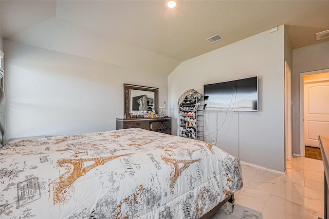 bedroom with visible vents, baseboards, marble finish floor, and vaulted ceiling