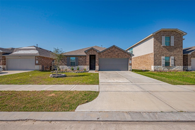 ranch-style home featuring brick siding, a garage, driveway, and a front lawn