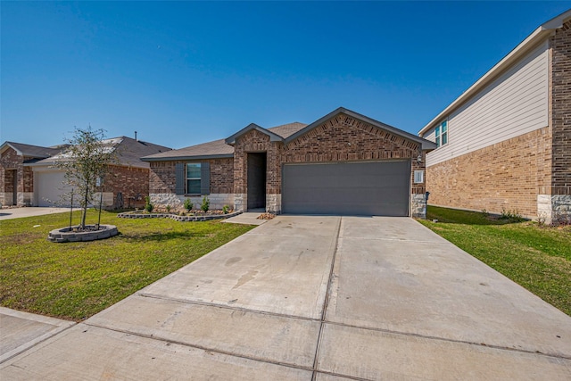 view of front of home featuring driveway, an attached garage, a front lawn, stone siding, and brick siding