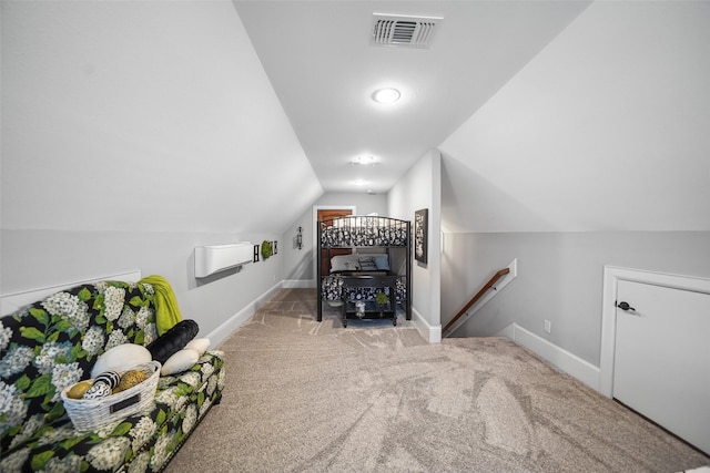 interior space featuring visible vents, baseboards, and lofted ceiling