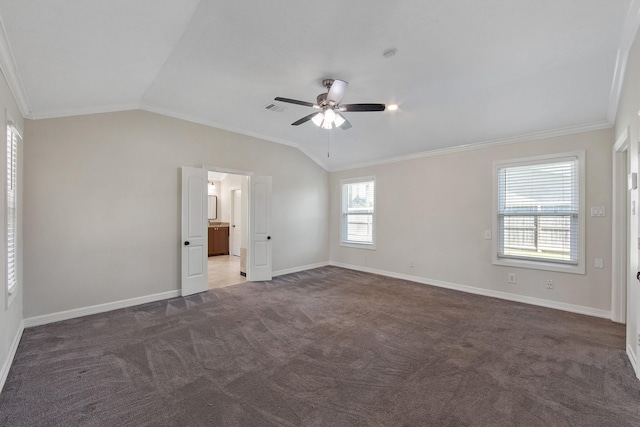 unfurnished bedroom with visible vents, baseboards, carpet, lofted ceiling, and ornamental molding