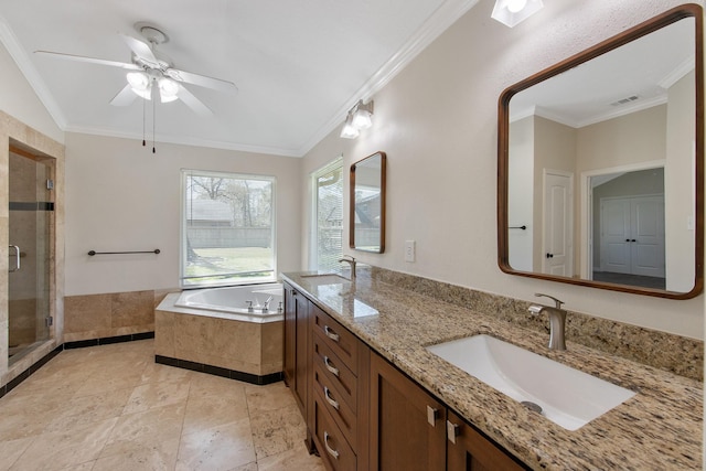 bathroom with visible vents, a garden tub, ornamental molding, a stall shower, and a sink