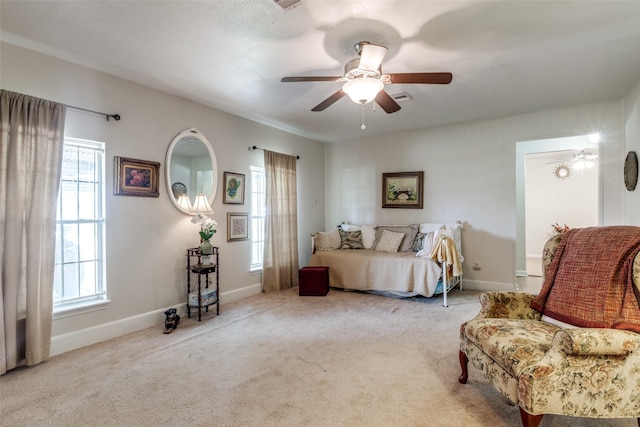 bedroom with baseboards, ceiling fan, and carpet flooring