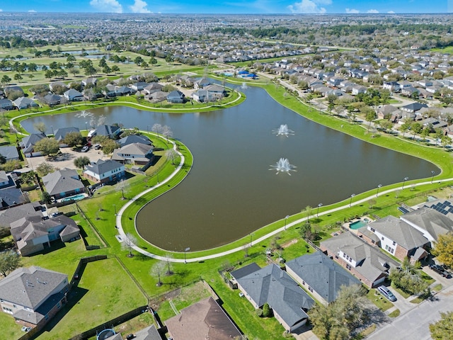 aerial view with a residential view and a water view