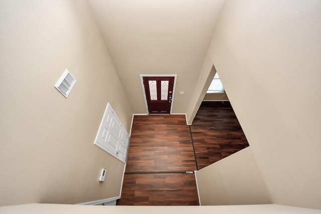 foyer featuring wood finished floors