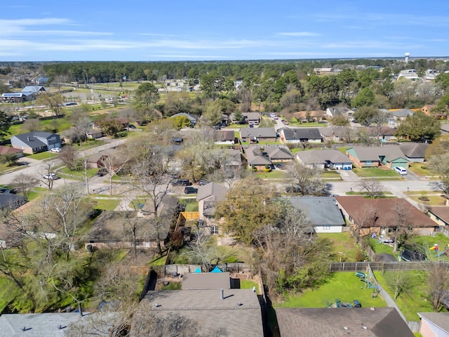 birds eye view of property with a residential view