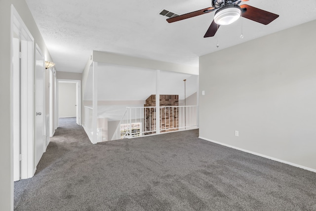 spare room featuring visible vents, baseboards, carpet, and ceiling fan