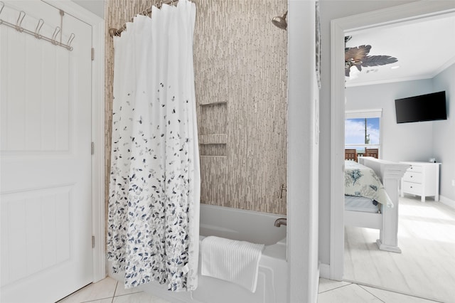 bathroom with tile patterned floors, shower / tub combo with curtain, and ornamental molding