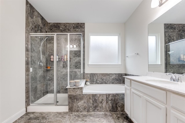 full bath with vanity, a shower stall, and a garden tub