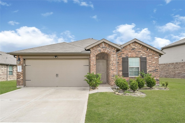 ranch-style house with a front yard, a garage, brick siding, and concrete driveway