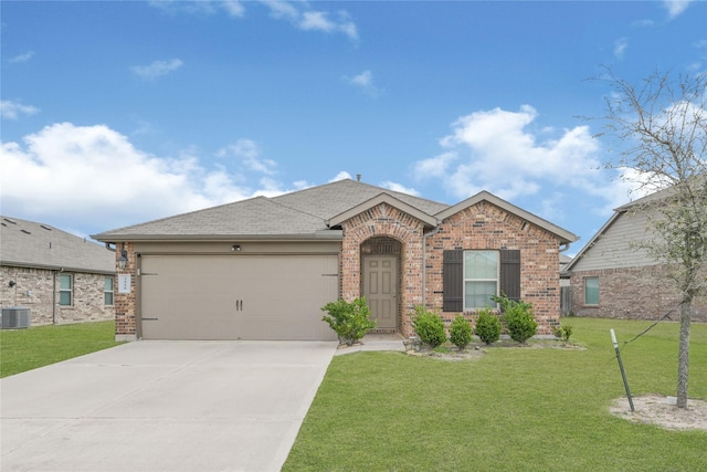 single story home featuring brick siding, an attached garage, driveway, and a front lawn