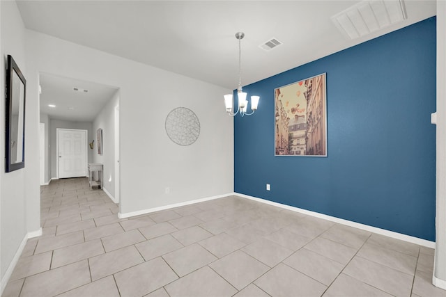 unfurnished room with visible vents, baseboards, a notable chandelier, and tile patterned flooring