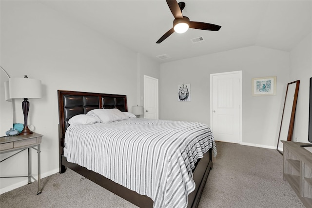 bedroom featuring visible vents, baseboards, carpet flooring, and vaulted ceiling