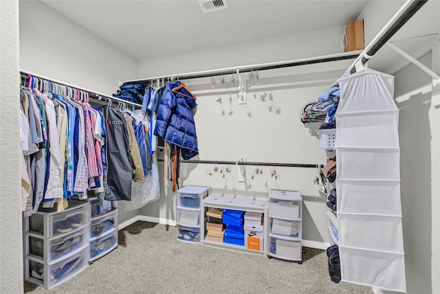 walk in closet with carpet and visible vents