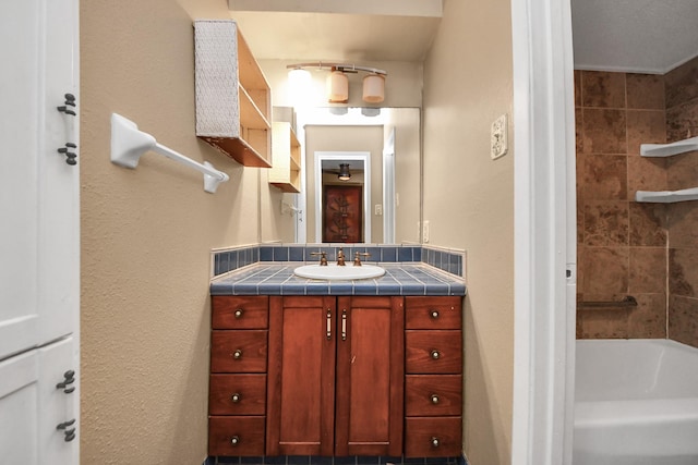 full bathroom featuring vanity and shower / bath combination