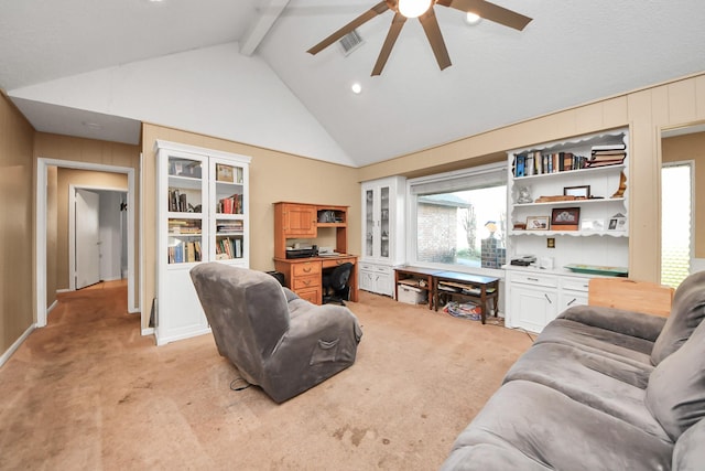 living room with visible vents, high vaulted ceiling, built in study area, beamed ceiling, and light colored carpet